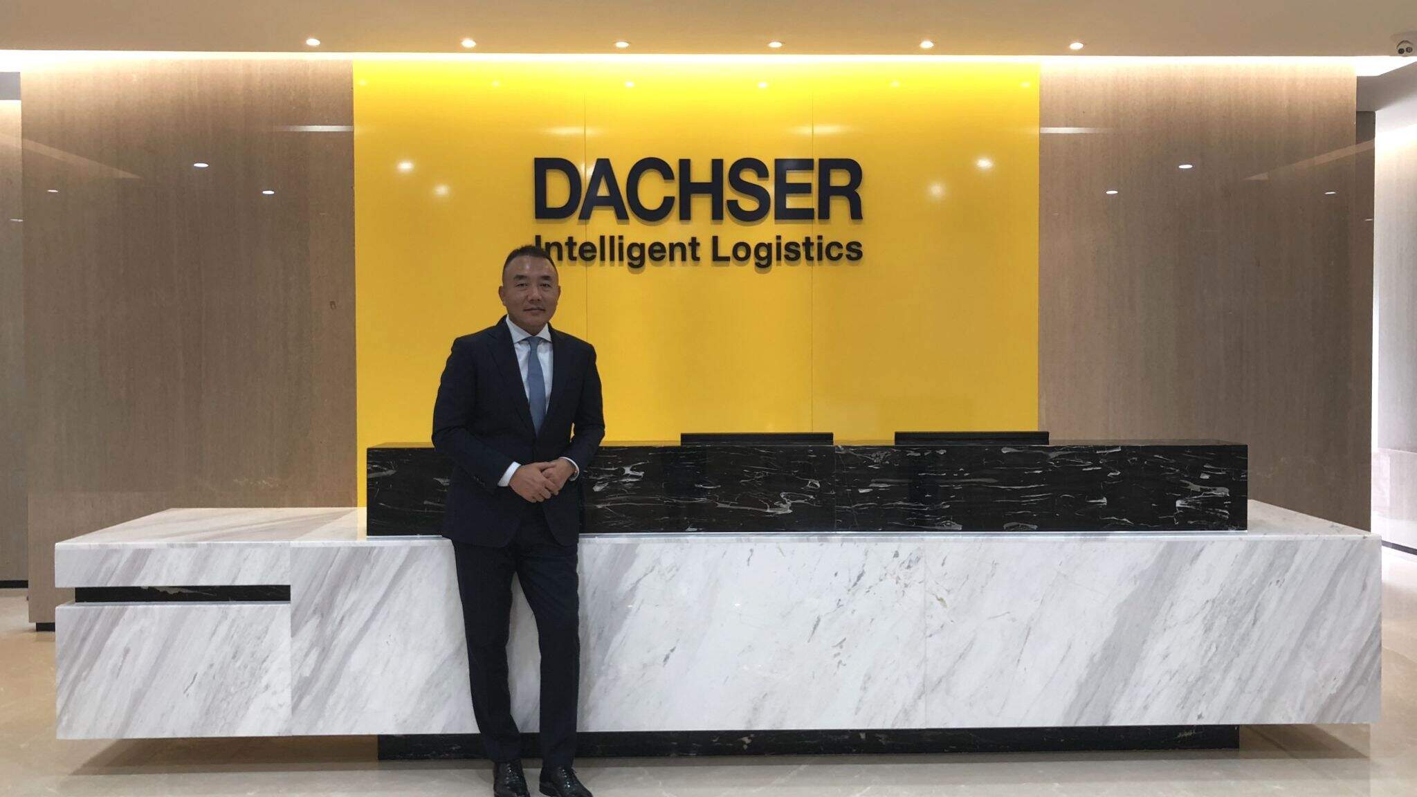 Kevin Chen, Managing Director Air & Sea Logistics Far East South, at the new office reception. Kevin Chen, Managing Director Air & Sea Logistics Far East South, at the new office reception.
